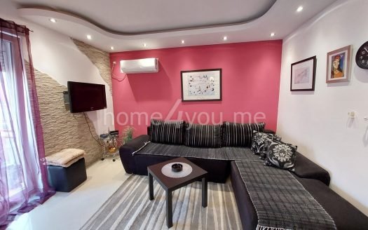 Completely renovated two-bedroom apartment with three terraces in Budva
