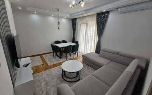 Furnished two-bedroom apartment with a spacious terrace and double garage, Bečići,Budva